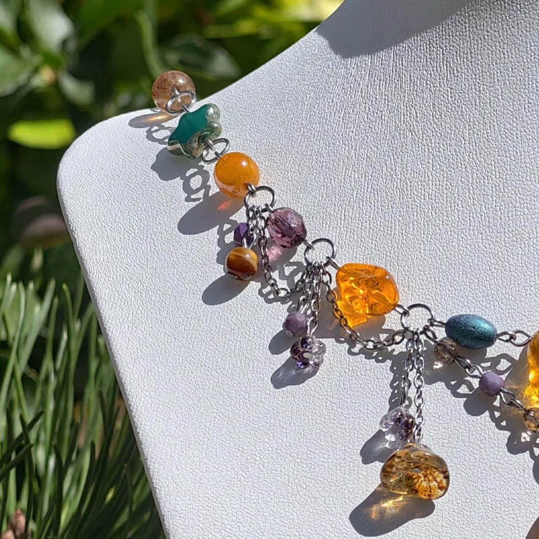 Venus of Willendorf, Fantasy Jewelry, Handmade jewelry, Whimsical Jewelry, Unique Jewelry. Royalcore Fairycore Jewelry, Orange and brown, side