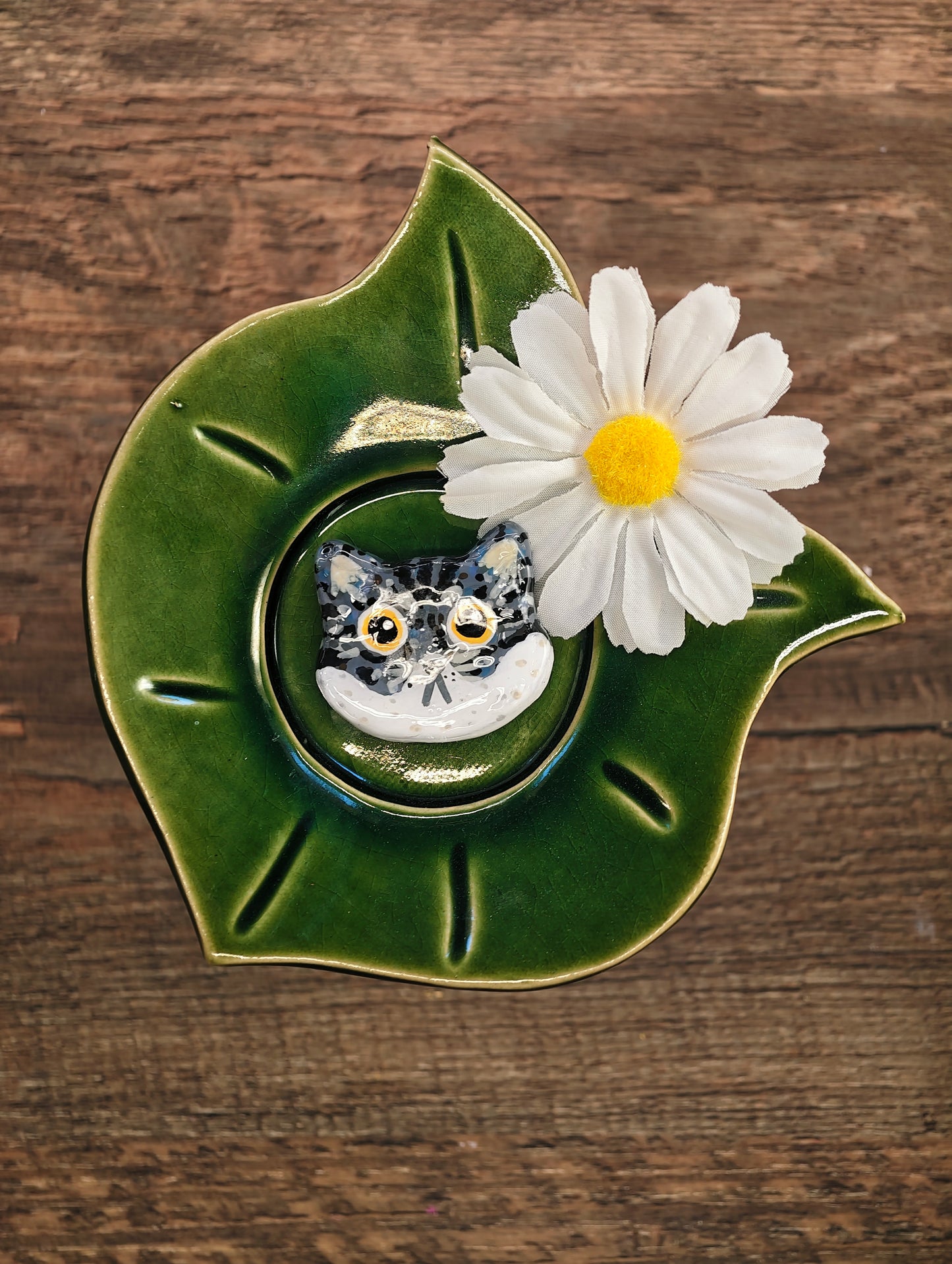 Novyra Jewelry and Clay Art Magent Grey head