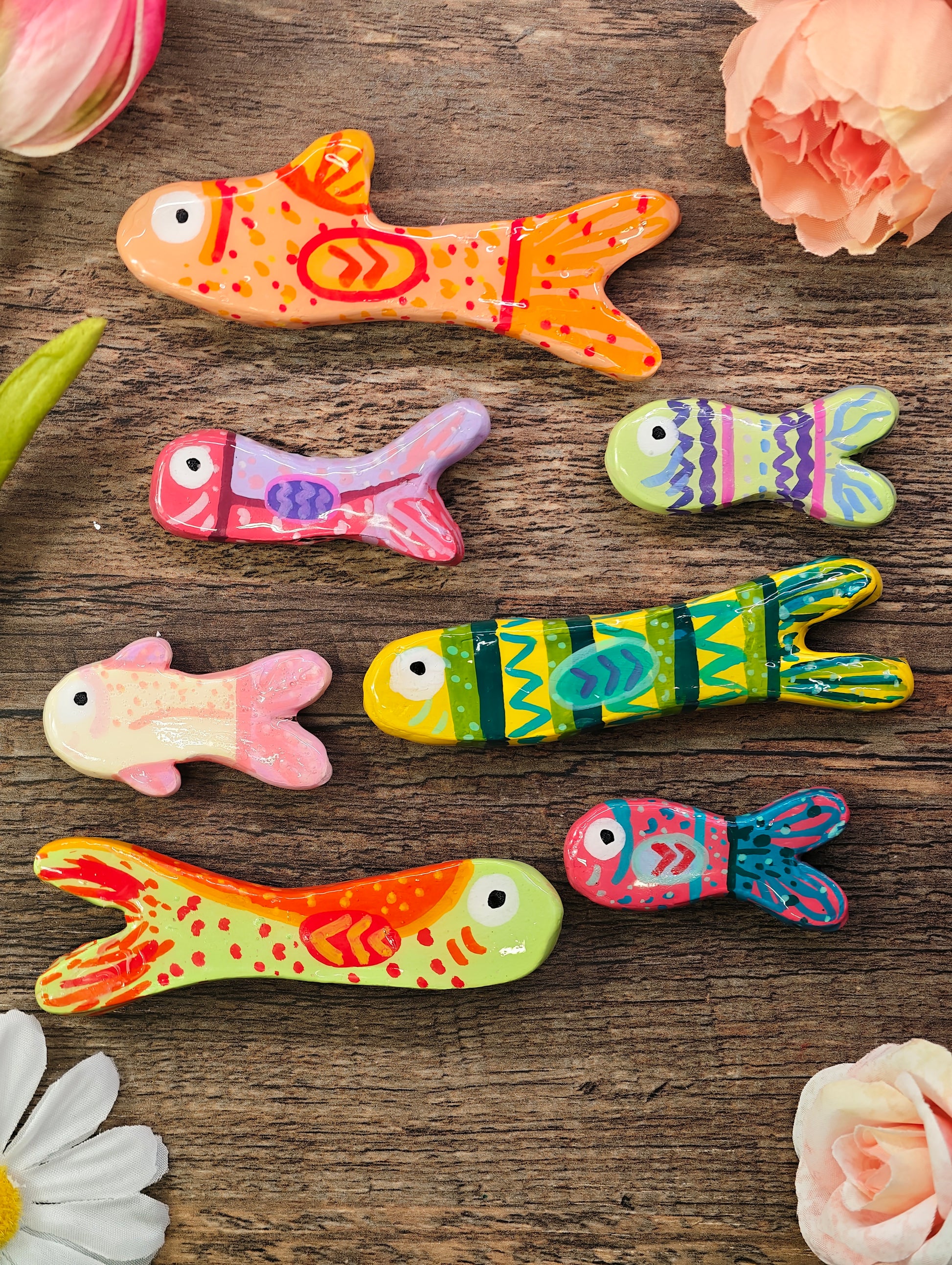 Novyra Jewelry and Clay Art fish Magent