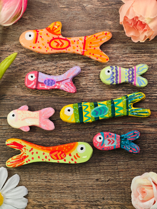 Novyra Jewelry and Clay Art fish Magent