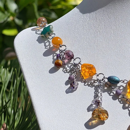 Venus of Willendorf, Fantasy Jewelry,  Handmade jewelry, Whimsical Jewelry, Unique Jewelry.  Royalcore Fairycore Jewelry, Orange and brown, side